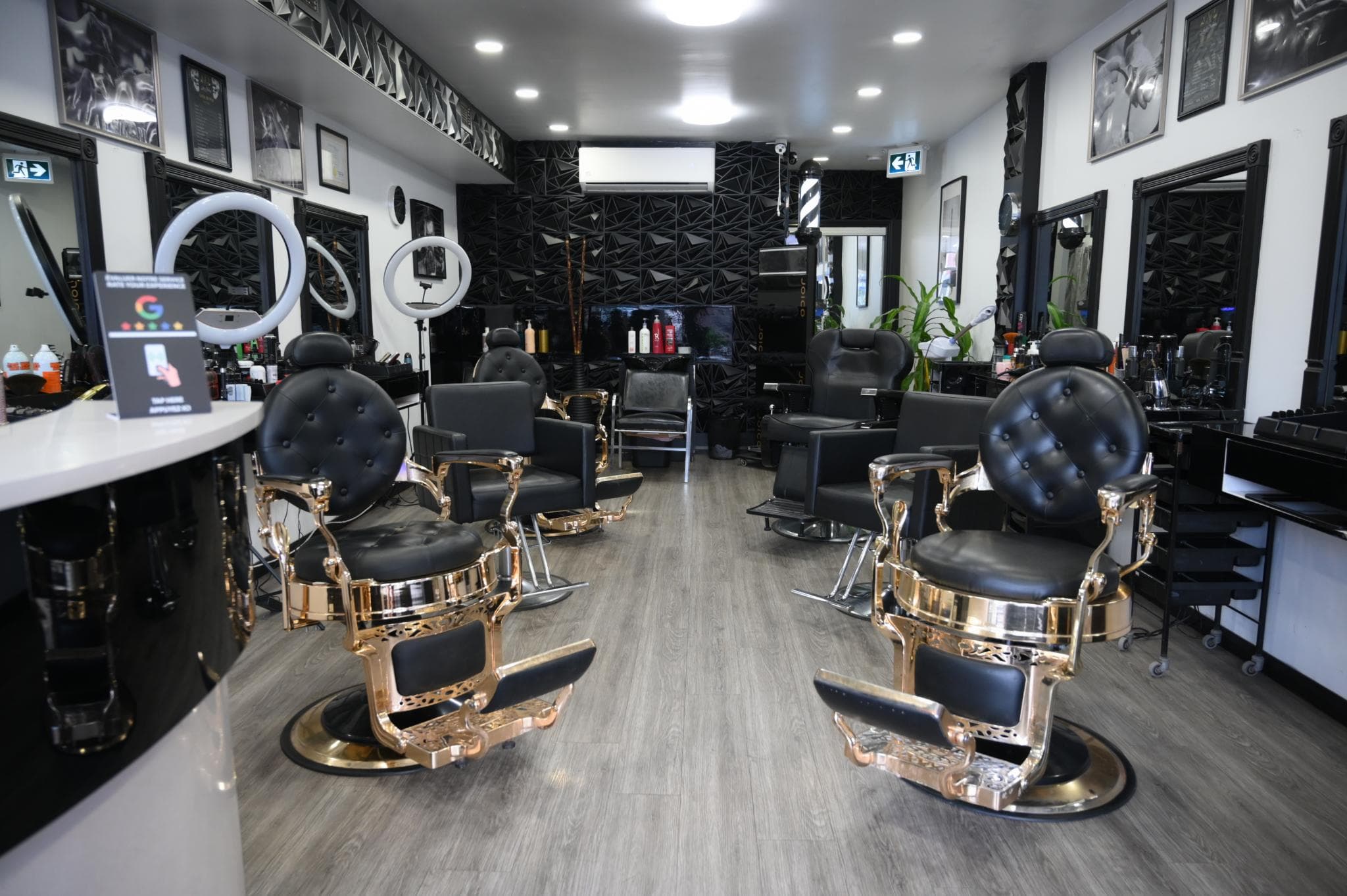 Modern interior of Salon Les Frères barbershop in Laval with professional barber chairs